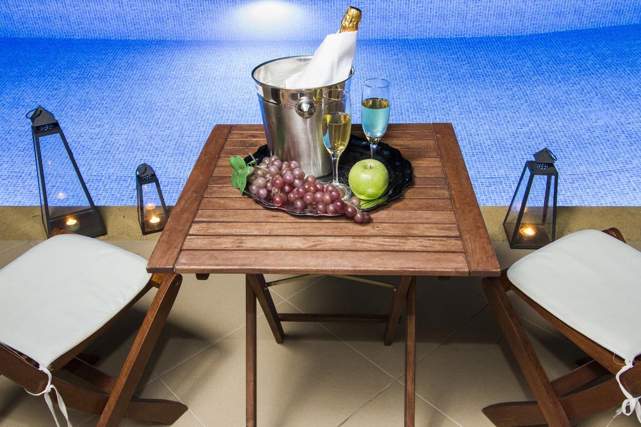 סאני ביץ' Muses Villas Resort מראה חיצוני תמונה